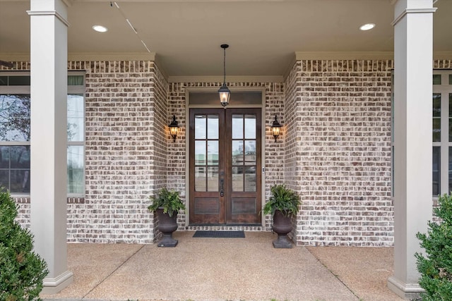 6742 Malone Rd, Olive Branch, MS 38654 - view of exterior entry featuring brick siding and french doors