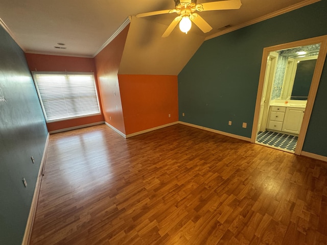 additional living space featuring ceiling fan, baseboards, visible vents, and wood finished floors