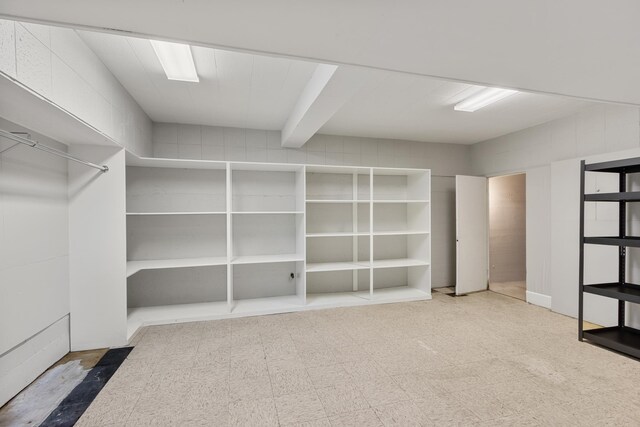 below grade area featuring tile patterned floors