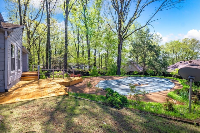 view of yard featuring a deck