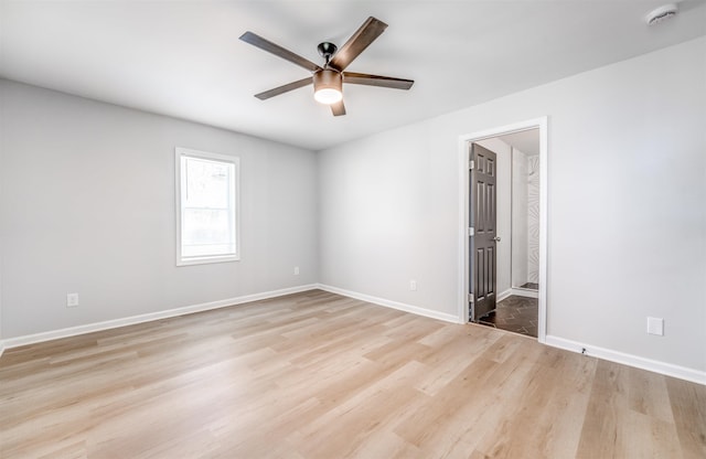 3191 Scenic Hwy, Memphis, TN 38128 - unfurnished room with light wood-type flooring, a ceiling fan, and baseboards