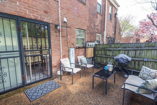 5718 Quince Rd Unit 4, Memphis, TN 38119 - view of patio / terrace with grilling area and fence