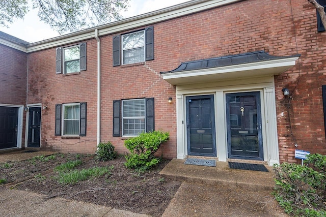 5718 Quince Rd Unit 4, Memphis, TN 38119 - property entrance featuring brick siding