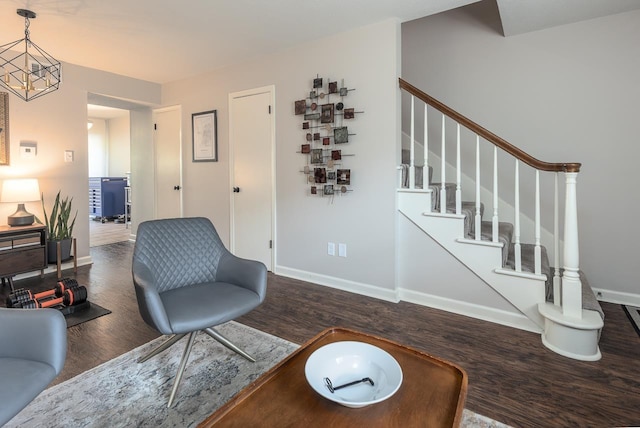 5718 Quince Rd Unit 4, Memphis, TN 38119 - living area featuring stairs, baseboards, an inviting chandelier, and wood finished floors