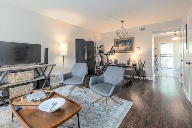 5718 Quince Rd Unit 4, Memphis, TN 38119 - living area with dark wood-type flooring, visible vents, and baseboards