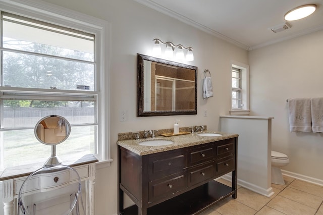 full bathroom with a stall shower, tile patterned flooring, toilet, and a sink
