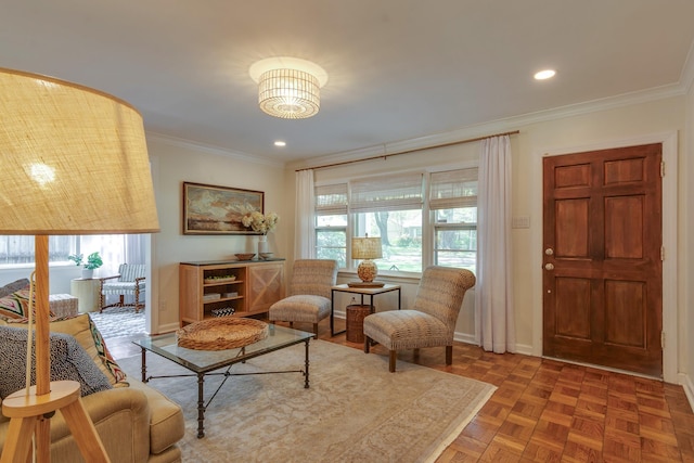 living area featuring crown molding, baseboards, and recessed lighting
