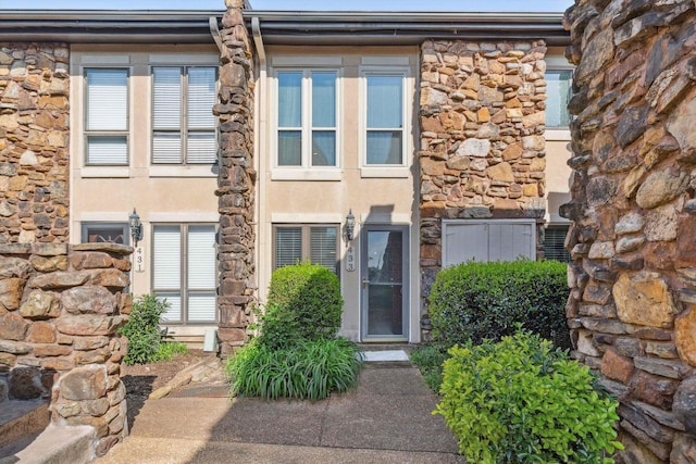 433 S Perkins Dr Unit 433, Memphis, TN 38117 - exterior space featuring stucco siding and stone siding