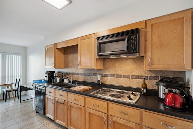 433 S Perkins Dr Unit 433, Memphis, TN 38117 - kitchen with tasteful backsplash, a sink, dark countertops, black appliances, and light tile patterned flooring