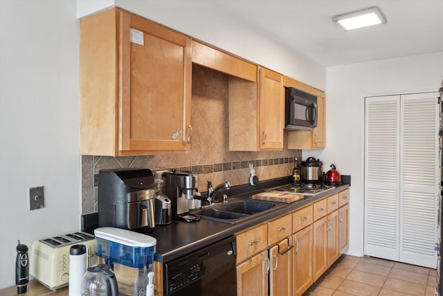 433 S Perkins Dr Unit 433, Memphis, TN 38117 - kitchen featuring light tile patterned floors, backsplash, dark countertops, black appliances, and a sink