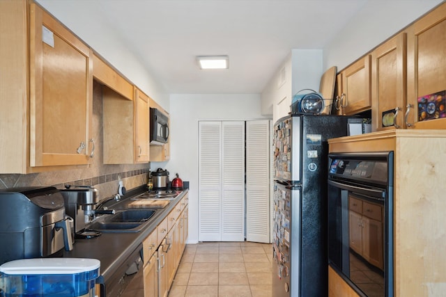433 S Perkins Dr Unit 433, Memphis, TN 38117 - kitchen featuring light tile patterned flooring, a sink, and black appliances