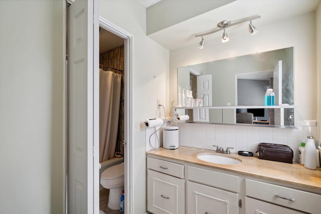 433 S Perkins Dr Unit 433, Memphis, TN 38117 - full bathroom featuring tasteful backsplash, toilet, a shower with shower curtain, and vanity