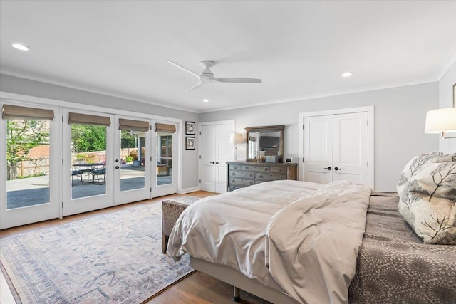 6555 Oak Estates Dr, Memphis, TN 38119 - bedroom with crown molding, two closets, recessed lighting, access to exterior, and french doors
