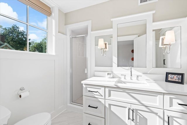 6555 Oak Estates Dr, Memphis, TN 38119 - full bath featuring vanity, a stall shower, and toilet