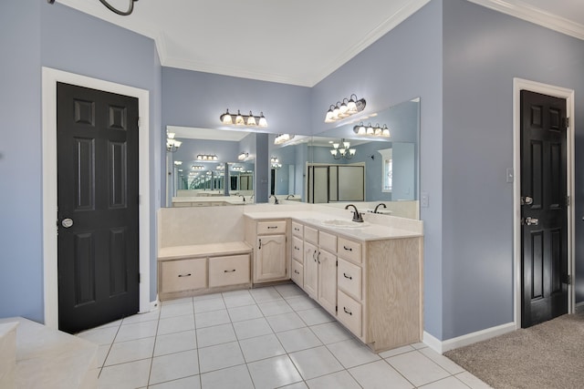 979 Welbeck Cv, Collierville, TN 38017 - full bath with vanity, a notable chandelier, baseboards, ornamental molding, and tile patterned flooring