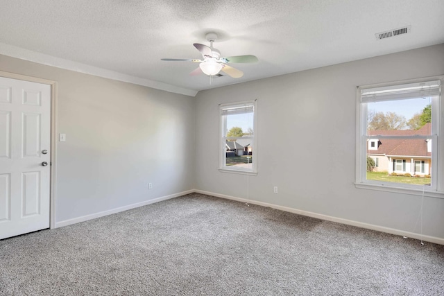 979 Welbeck Cv, Collierville, TN 38017 - carpeted spare room with visible vents, ceiling fan, baseboards, and a textured ceiling