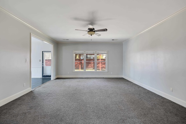 979 Welbeck Cv, Collierville, TN 38017 - empty room with a ceiling fan, dark carpet, baseboards, and ornamental molding