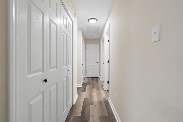 1098 Capital Ave, Memphis, TN 38107 - hallway featuring baseboards and dark wood finished floors