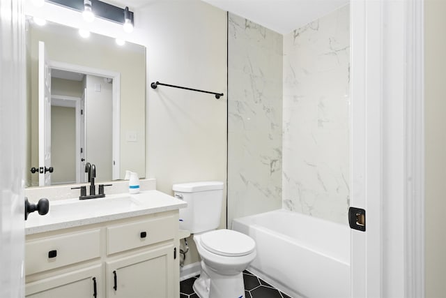 1098 Capital Ave, Memphis, TN 38107 - bathroom featuring tile patterned floors, toilet, vanity, and shower / bathtub combination