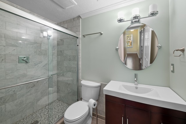 7545 Wheatley Dr, Germantown, TN 38138 - bathroom with visible vents, toilet, a textured ceiling, vanity, and a stall shower