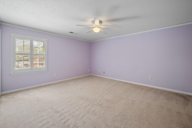 7545 Wheatley Dr, Germantown, TN 38138 - spare room with visible vents, ceiling fan, and light colored carpet
