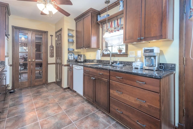 8453 Farrah Ln, Germantown, TN 38139 - kitchen featuring dark tile patterned floors, dark stone countertops, ceiling fan, white dishwasher, and a sink