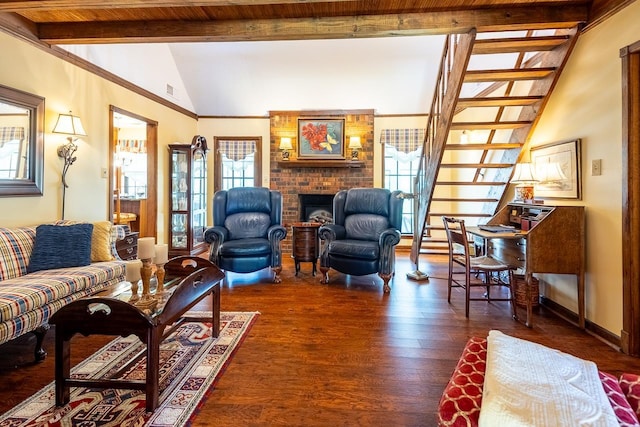 8453 Farrah Ln, Germantown, TN 38139 - living room with wood finished floors, lofted ceiling with beams, a brick fireplace, and stairway
