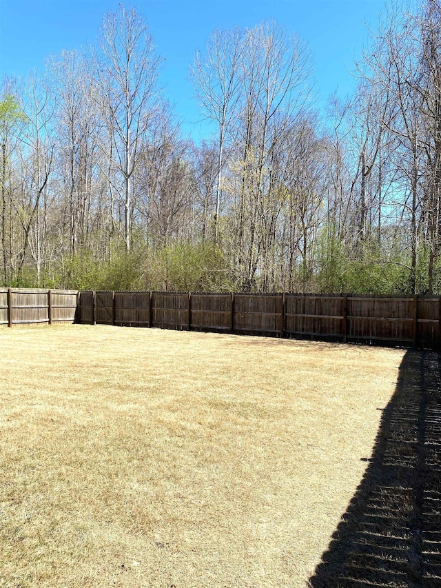 view of yard featuring fence