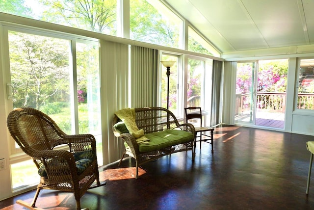 sunroom / solarium with lofted ceiling