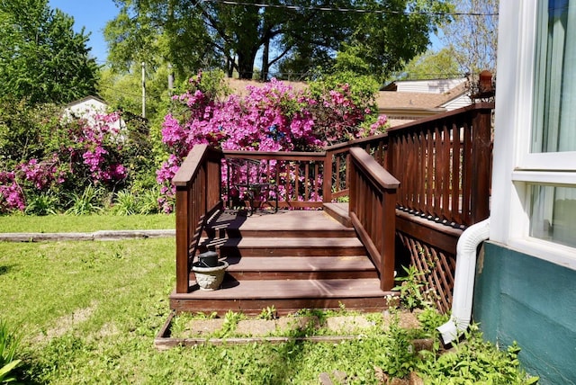 deck featuring a yard