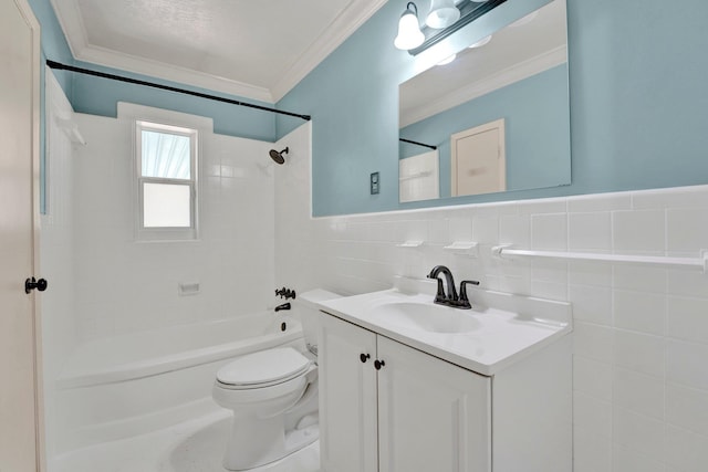full bath featuring crown molding, tub / shower combination, vanity, toilet, and tile walls