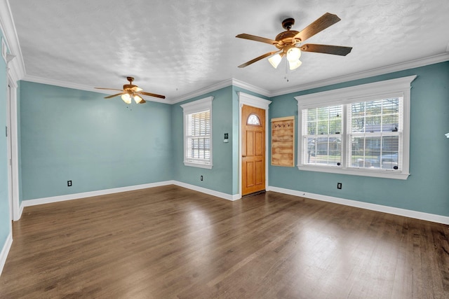 interior space with ceiling fan, plenty of natural light, baseboards, and dark wood-style floors