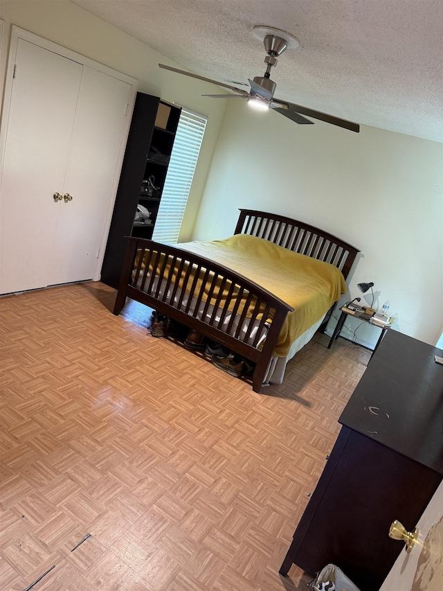 3287 Leschallas Dr, Memphis, TN 38128 - bedroom with a textured ceiling and ceiling fan