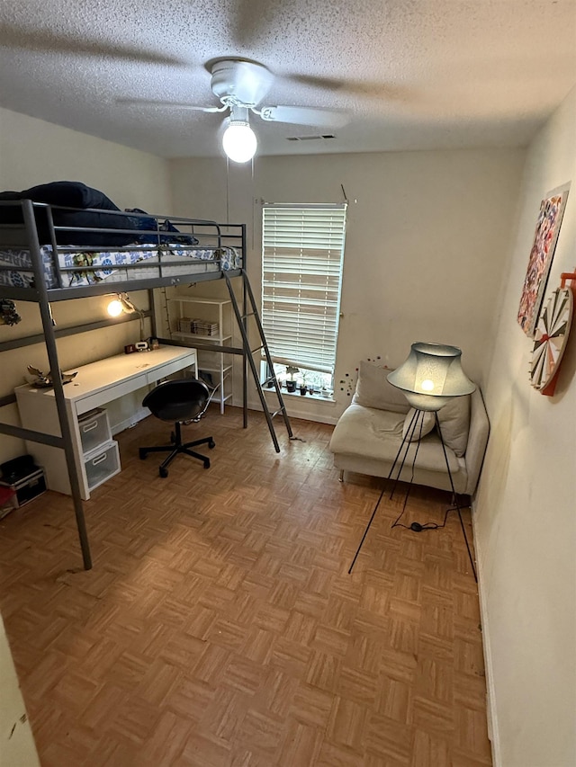 3287 Leschallas Dr, Memphis, TN 38128 - bedroom with ceiling fan and a textured ceiling
