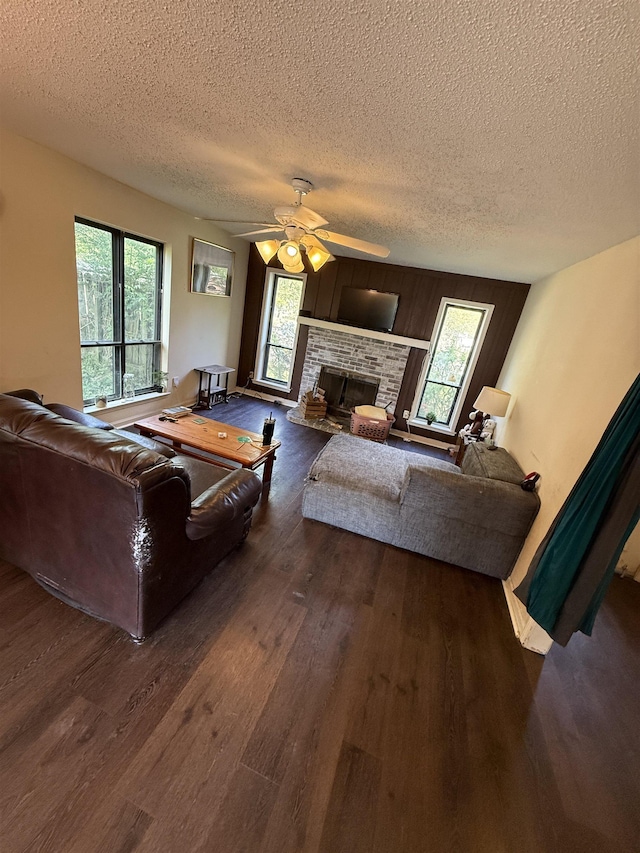 3287 Leschallas Dr, Memphis, TN 38128 - living area with a healthy amount of sunlight, wood finished floors, and a textured ceiling