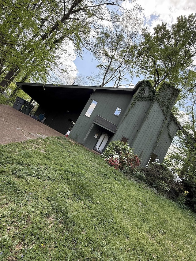 3287 Leschallas Dr, Memphis, TN 38128 - entry to storm shelter featuring a yard