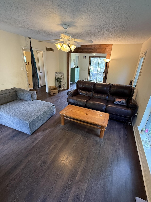 3287 Leschallas Dr, Memphis, TN 38128 - living room featuring visible vents, a ceiling fan, wood finished floors, and a textured ceiling
