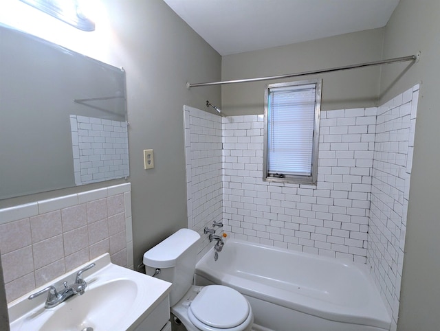1337 Haywood Ave, Memphis, TN 38127 - bathroom featuring toilet, washtub / shower combination, and vanity