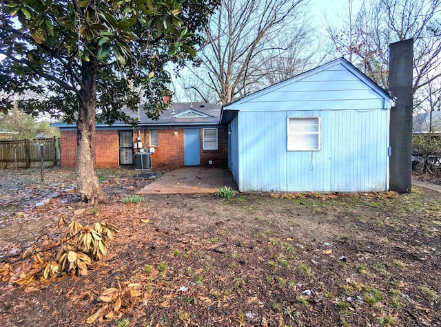 1337 Haywood Ave, Memphis, TN 38127 - back of property with central AC unit and brick siding