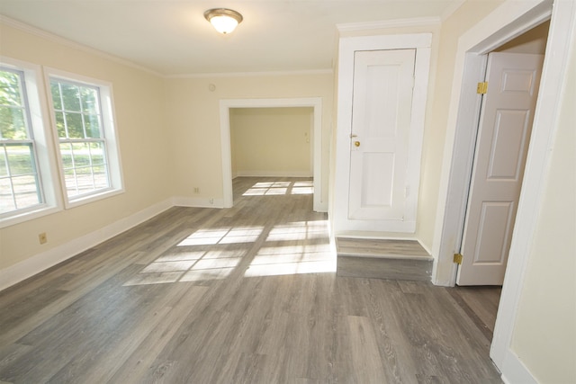 899 Craft Rd, Memphis, TN 38116 - spare room with baseboards, ornamental molding, and wood finished floors