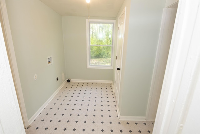 899 Craft Rd, Memphis, TN 38116 - washroom featuring laundry area, light floors, washer hookup, hookup for an electric dryer, and baseboards