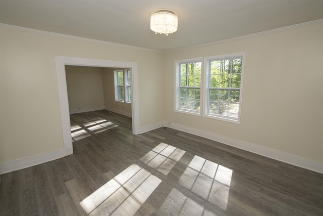 899 Craft Rd, Memphis, TN 38116 - unfurnished room featuring ornamental molding, baseboards, a chandelier, and wood finished floors