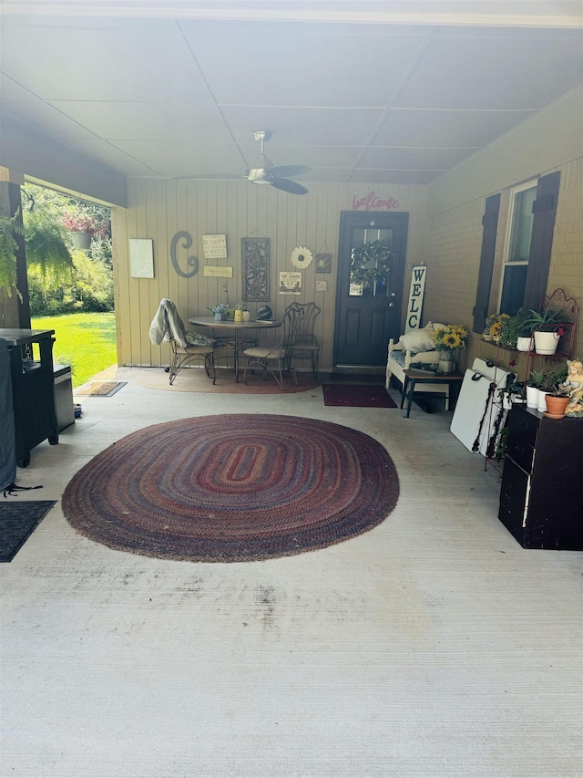 exterior space featuring ceiling fan