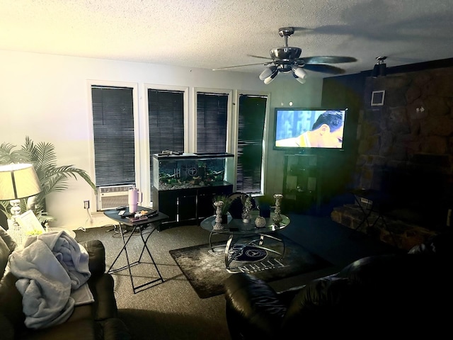carpeted living area with visible vents, ceiling fan, cooling unit, and a textured ceiling