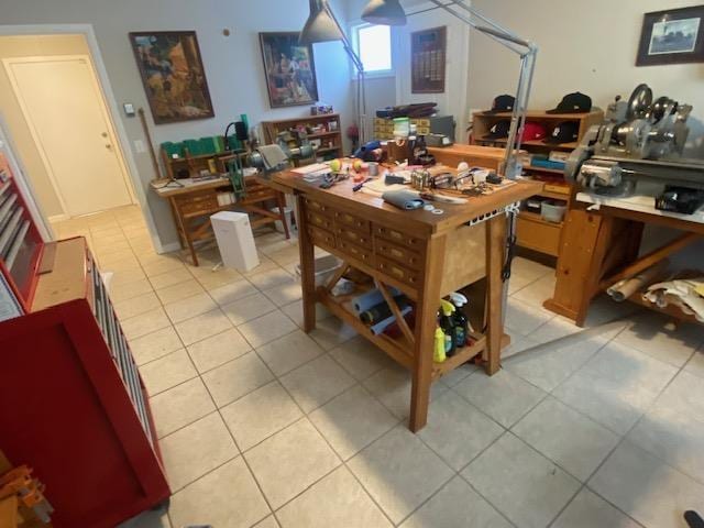 dining area with light tile patterned floors