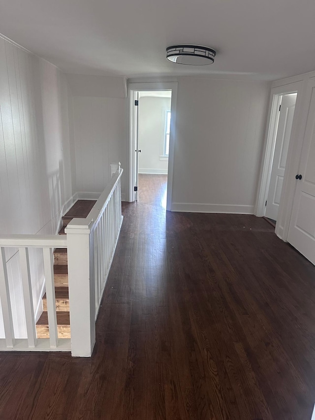 137 W S St, Dyer, TN 38330 - hall with baseboards, dark wood finished floors, and an upstairs landing