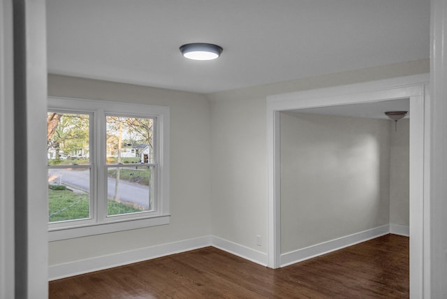 137 W S St, Dyer, TN 38330 - unfurnished room featuring baseboards and dark wood finished floors