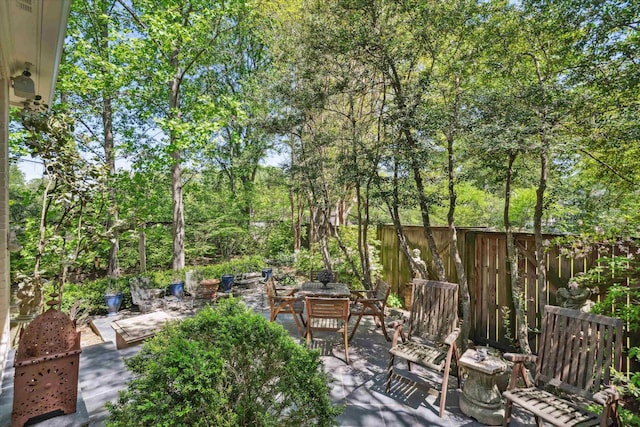 view of patio / terrace featuring fence