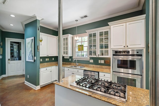 kitchen with glass insert cabinets, finished concrete flooring, white cabinetry, stainless steel appliances, and a sink