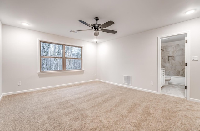 185 Valleyview Ln, Oakland, TN 38060 - unfurnished bedroom with light carpet, ensuite bath, visible vents, and baseboards